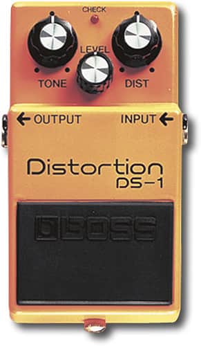 Boss DS-1 Distortion pedal on a pedalboard with guitar cables